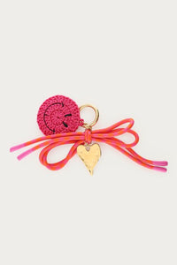 Roze bag charm happy