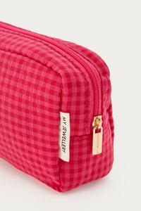 Roze toilettas met rode ruit
